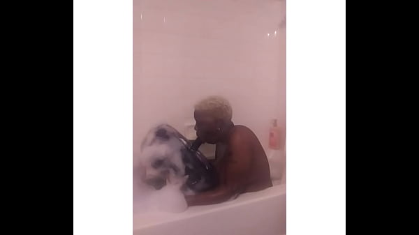 NPLEASURES ENJOYING A BUBBLE BATH