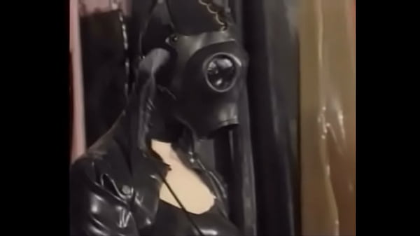 Natalia Muehlhausen latex slave in hood and gasmask gets a good fuck from her master (from '_Gummi in der Ehe'_)